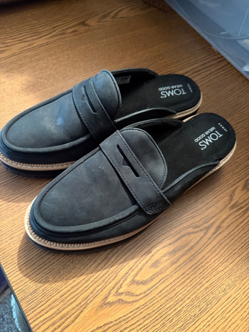 Toms women’s Black Penny Loafer Slip-On Mules with Tan Trim